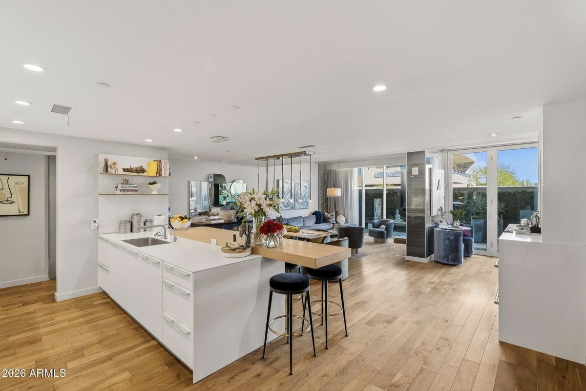 Open kitchen & living with bifold doors to the garden