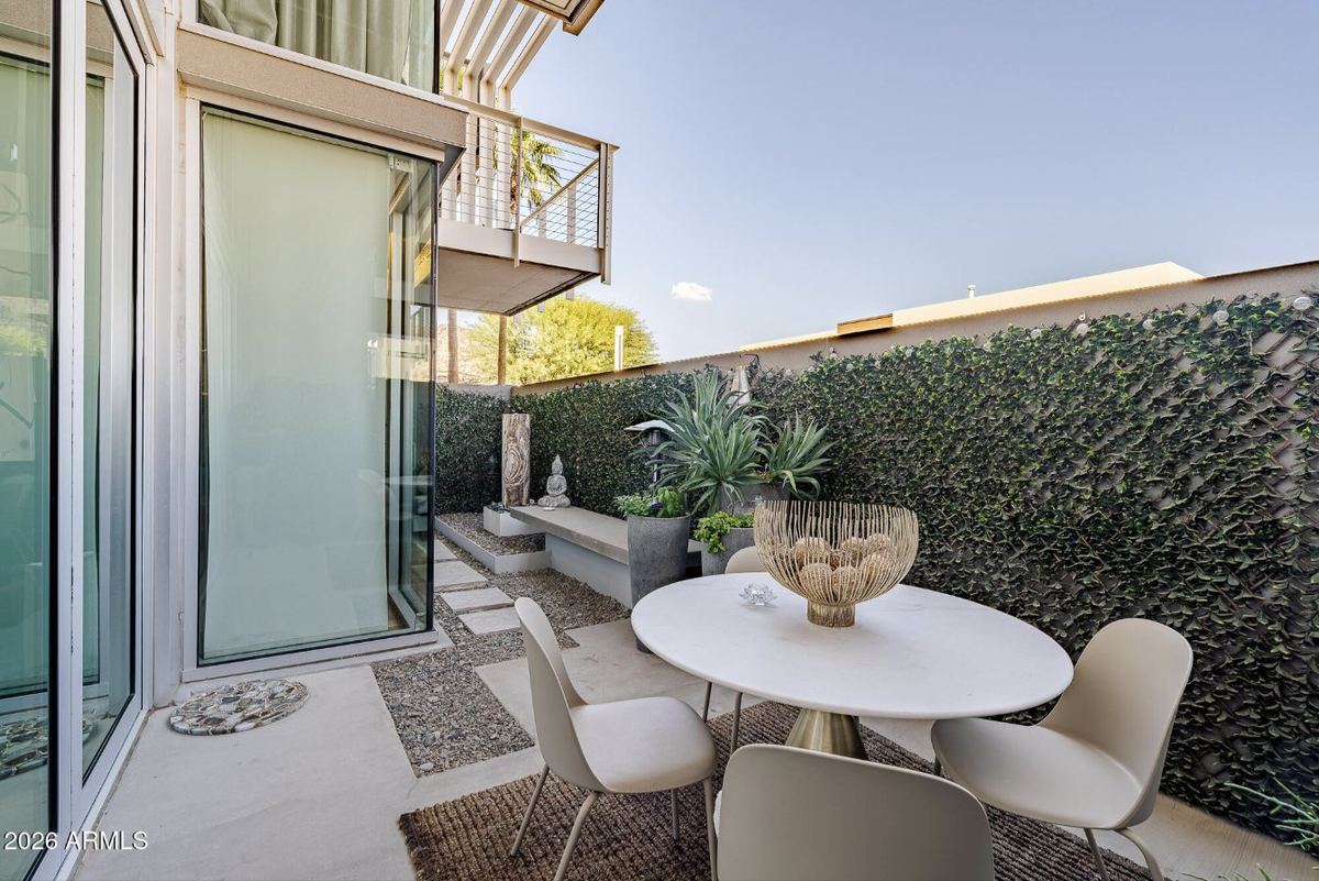 Private garden patio with built-in bench