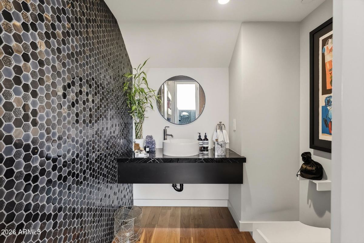 Powder room with glass mosaic tile