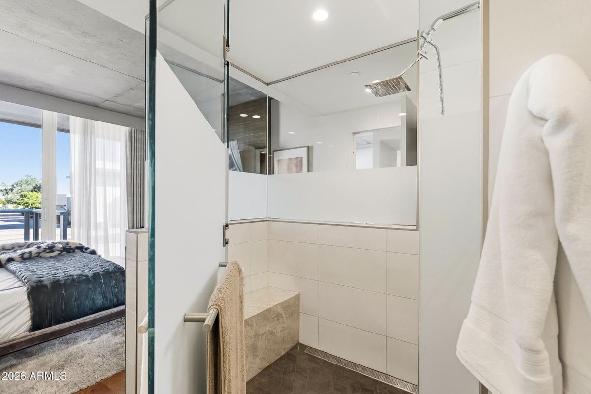 Primary walk-in shower with bench