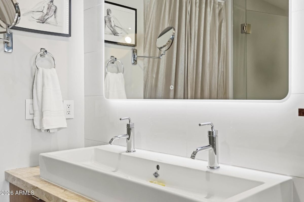 Dual-faucet trough sink & backlit mirror